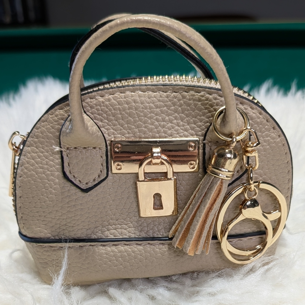 Elegant Tan Handbag with Gold Accents